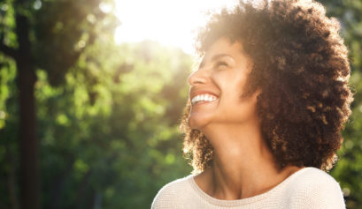 Woman Smiling in Sunshine